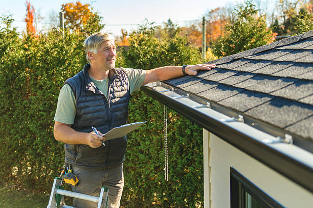 Professional Roof Replacement technician working in Gratz, PA
